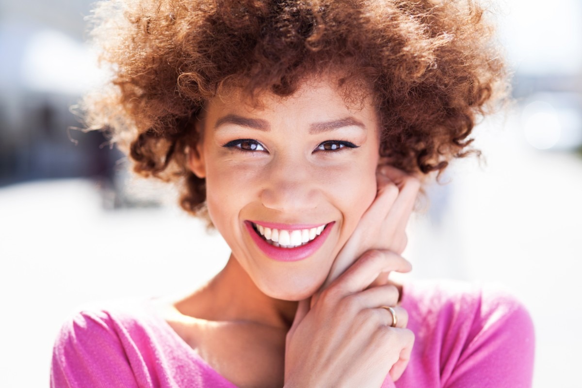 Woman smiling with straight teeth
